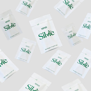 Silvie Mind packets scattered on a light surface
