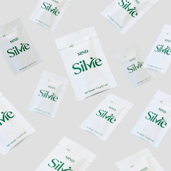 Silvie Mind packets scattered on a light surface