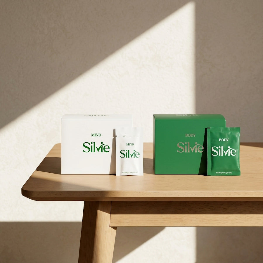 Silvie supplement packagings and boxes on a wooden table.
