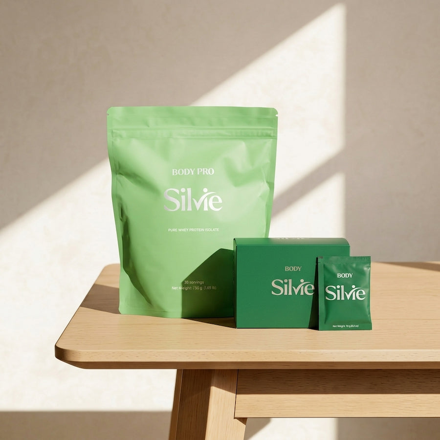 Silvie supplement packagings on a wooden table.